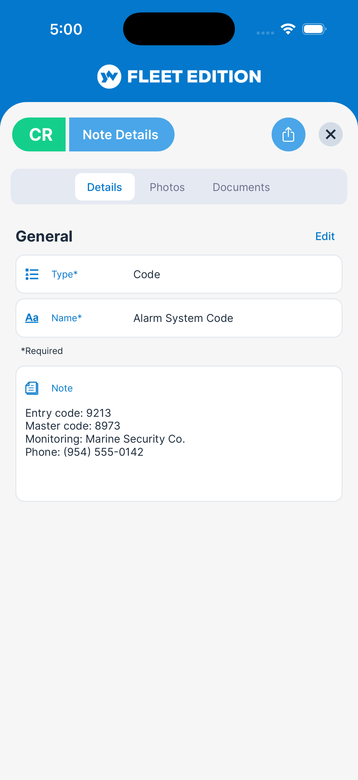 YACHTWAVE yacht management software: a note open in the mobile app — the alarm system's operating details and the monitoring company's phone number, with Photos and Documents tabs on the note