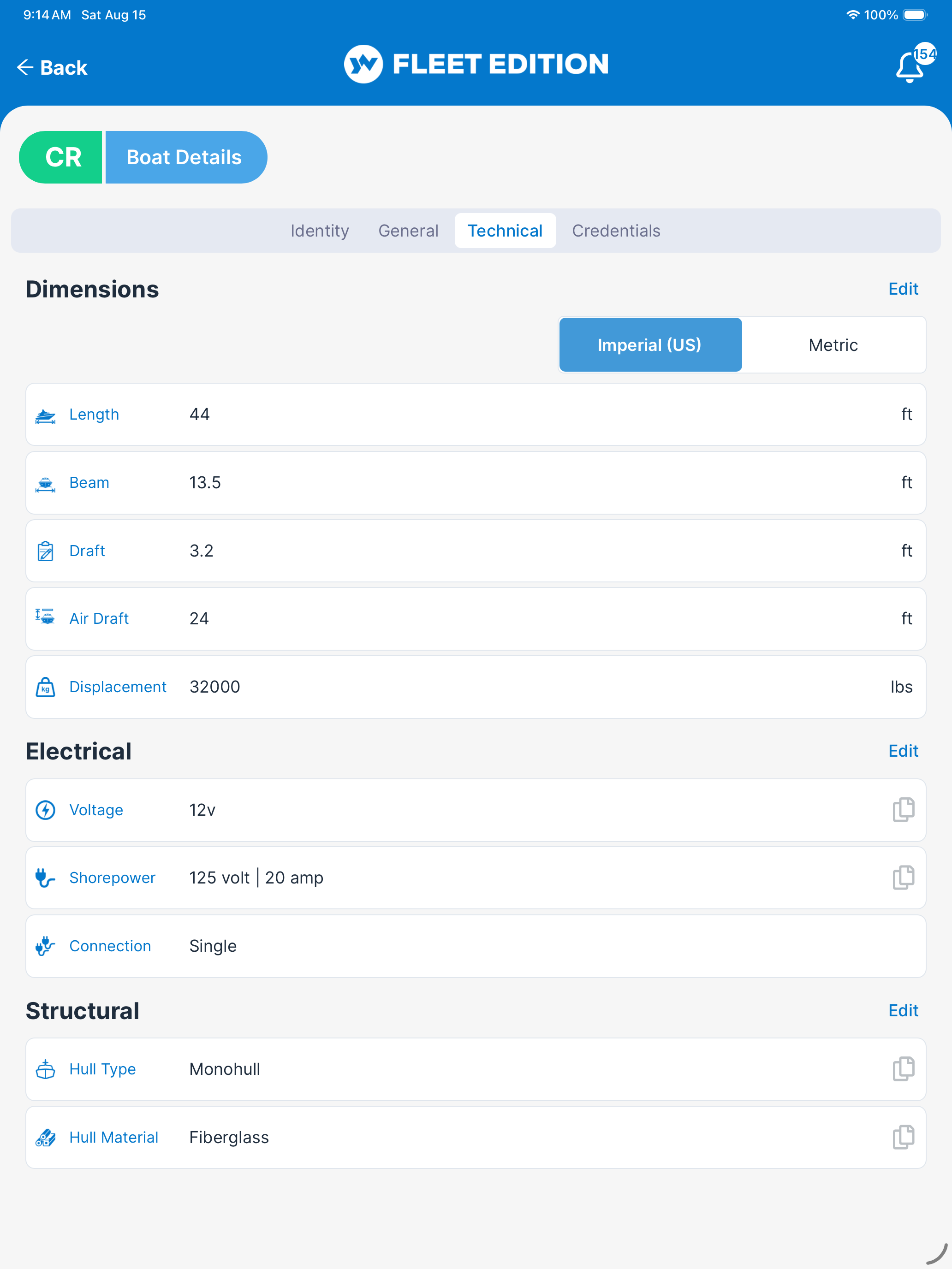 YACHTWAVE yacht management software: on a tablet showing a vessel's technical record: length, beam, draft, air draft and displacement, electrical voltage and shore power, and hull type and material